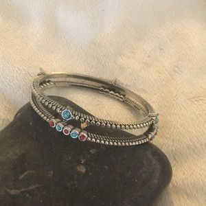 Stainless steel turquoise and coral like stones.